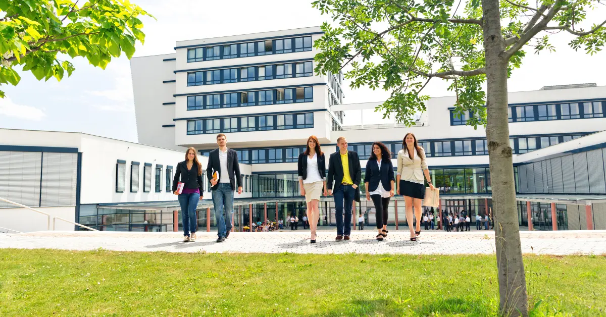 students walking from college campus in summer