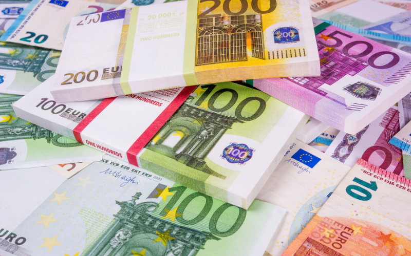 lots of euro bills on the table